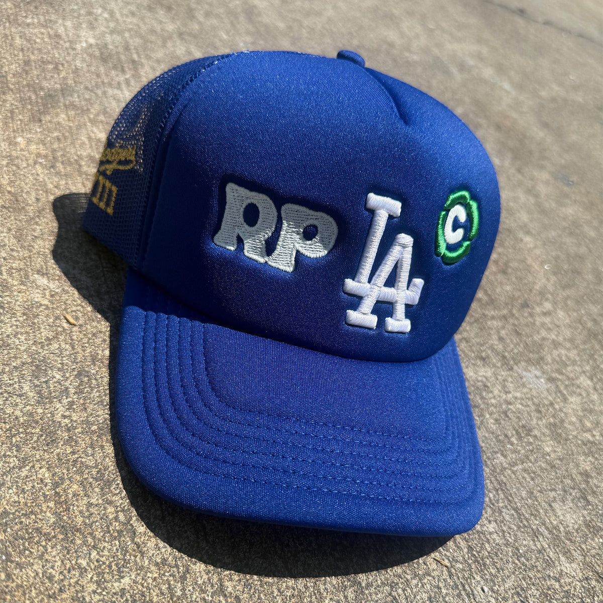 Rosie Prints LA Glow Trucker Hat Blue