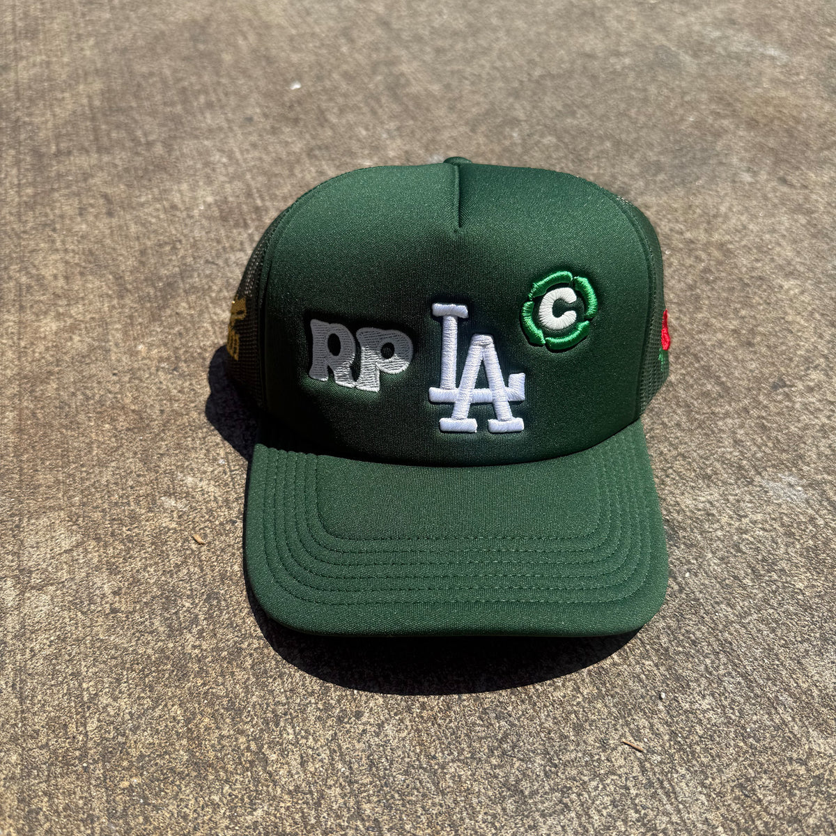 Rosie Prints LA Glow Trucker Hat Green
