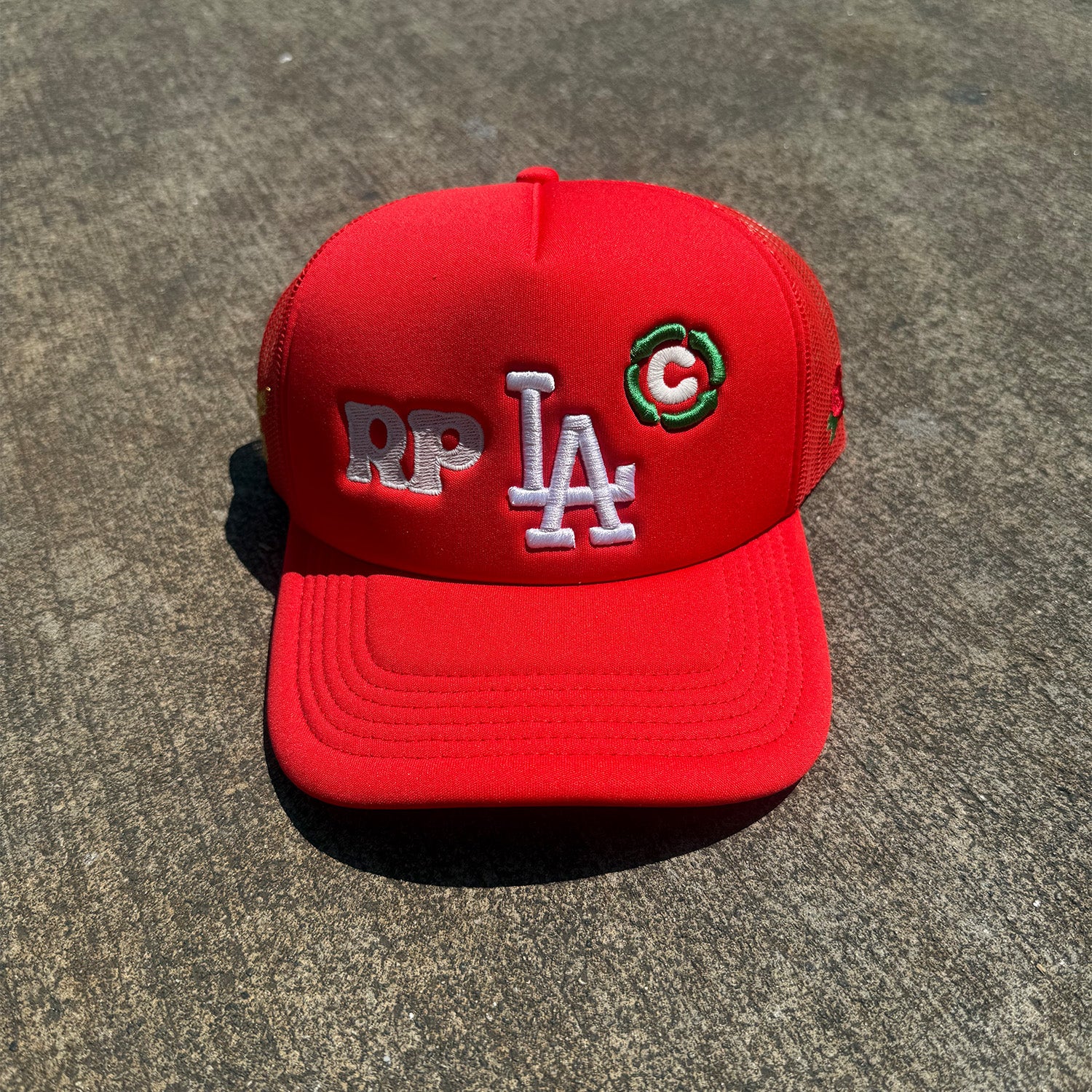 Rosie Prints LA Glow Trucker Hat Red